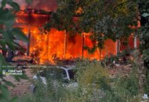 Дрони атакували українські міста: горять будівлі, є влучання